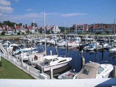 Deeded 30' boat slip in the charming Nantucket style community - photo 3
