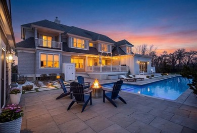 Set on three private acres abutting Newport National Golf Club - photo 1
