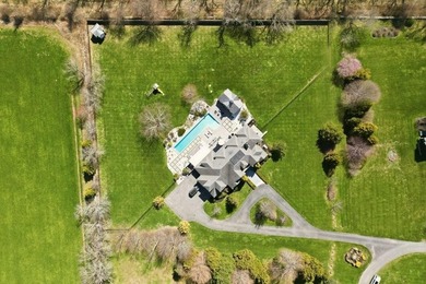 Set on three private acres abutting Newport National Golf Club - photo 8