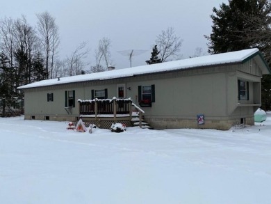 Lake Home Sale Pending in Mountain, Wisconsin