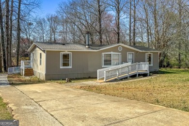 Lake Home For Sale in Locust Grove, Georgia
