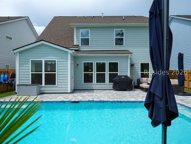 The custom heated and chilled in-ground pool, water features - photo 5