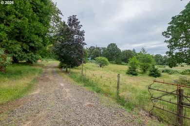 Follow the long private driveway to this secluded 84+ acre farm - photo 4