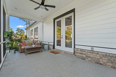 Set behind the gates of Cypress River Plantation, this modern - photo 31