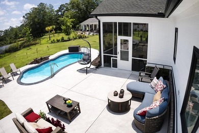 Set behind the gates of Cypress River Plantation, this modern - photo 32