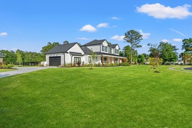 Set behind the gates of Cypress River Plantation, this modern - photo 33