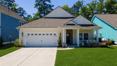 Welcome to this beautifully maintained home in the highly - photo 1