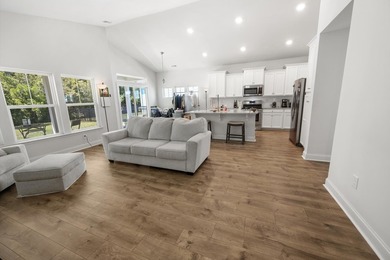 Welcome to this beautifully maintained home in the highly - photo 3