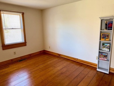 This well-maintained home offers a bright and inviting layout - photo 11