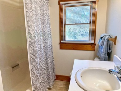 This well-maintained home offers a bright and inviting layout - photo 18
