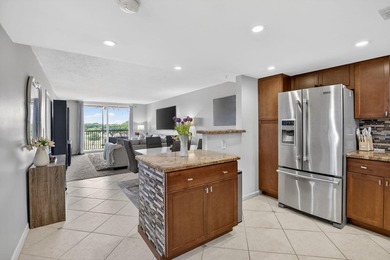 Spectacular lake and golf course views from this light and - photo 1