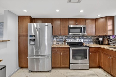 Spectacular lake and golf course views from this light and - photo 4