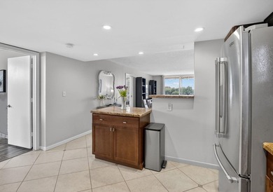 Spectacular lake and golf course views from this light and - photo 8