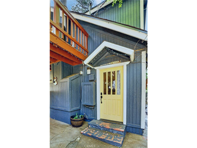 The four bears cabin sits perched on a quiet and unique street - photo 3