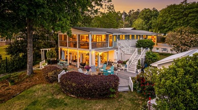 Welcome to 1204 Joyner Drive, a distinctive lakefront residence - photo 1