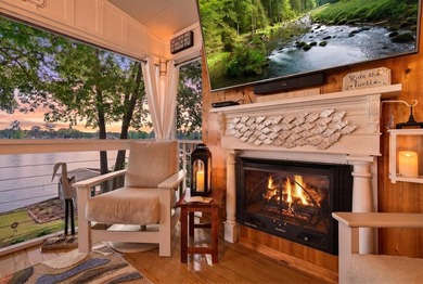 Welcome to 1204 Joyner Drive, a distinctive lakefront residence - photo 2