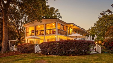 Welcome to 1204 Joyner Drive, a distinctive lakefront residence - photo 4