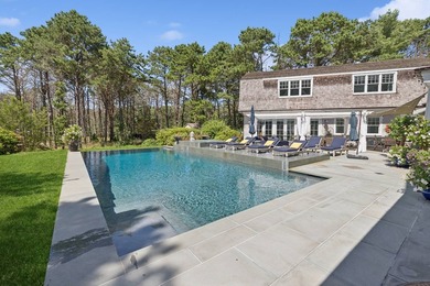 Set on 1.10 private acres backing a protected Georgica Estates - photo 8