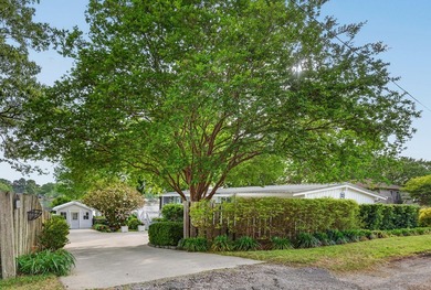 Welcome to 1204 Joyner Drive, a distinctive lakefront residence - photo 10
