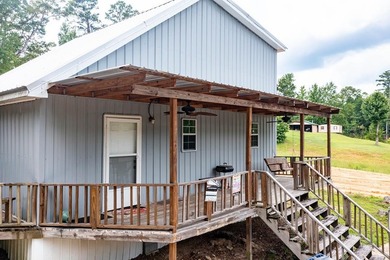 Experience the best of lake living with two homes on one - photo 19