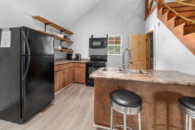 Experience the best of lake living with two homes on one - photo 21