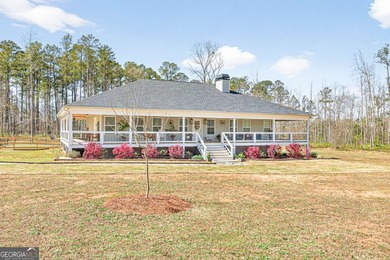 Country Living on 7.22 Acres with Wraparound Porch! Built in