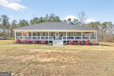Country Living on 7.22 Acres with Wraparound Porch! Built in