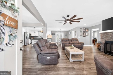 Country Living on 7.22 Acres with Wraparound Porch! Built in