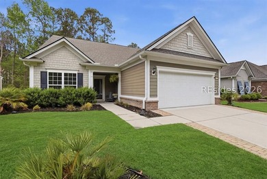Set on a premium lagoon-view homesite with privacy both front - photo 1