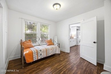 Fully Occupied, beautifully renovated Riverside duplex in an - photo 12