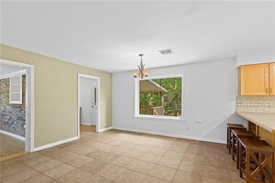 Tucked away on 1.4 private acres along a calm, scenic waterway - photo 12