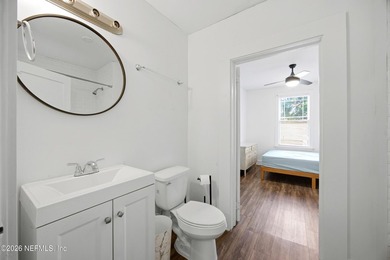 Fully Occupied, beautifully renovated Riverside duplex in an - photo 13