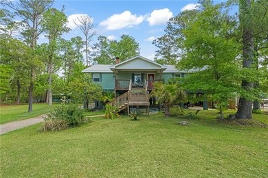 Tucked away on 1.4 private acres along a calm, scenic waterway - photo 27