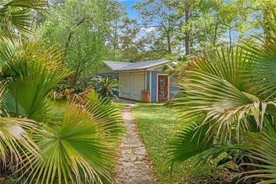 Tucked away on 1.4 private acres along a calm, scenic waterway - photo 28