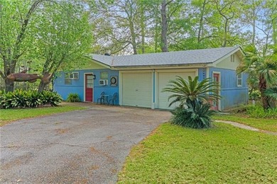 Tucked away on 1.4 private acres along a calm, scenic waterway - photo 29