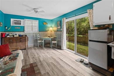 Tucked away on 1.4 private acres along a calm, scenic waterway - photo 31