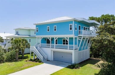 Welcome to 5 Tradewind Lane, a stunning coastal retreat in the - photo 2