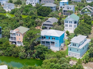 Welcome to 5 Tradewind Lane, a stunning coastal retreat in the - photo 4