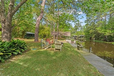 Tucked away on 1.4 private acres along a calm, scenic waterway - photo 35