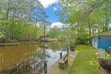 Tucked away on 1.4 private acres along a calm, scenic waterway - photo 36