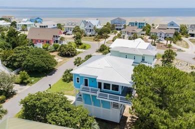 Welcome to 5 Tradewind Lane, a stunning coastal retreat in the - photo 7