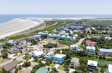 Welcome to 5 Tradewind Lane, a stunning coastal retreat in the - photo 8