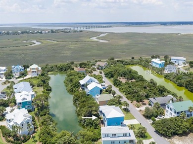 Welcome to 5 Tradewind Lane, a stunning coastal retreat in the - photo 9