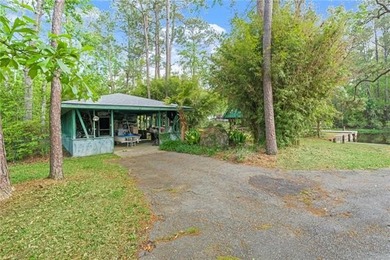 Tucked away on 1.4 private acres along a calm, scenic waterway - photo 40