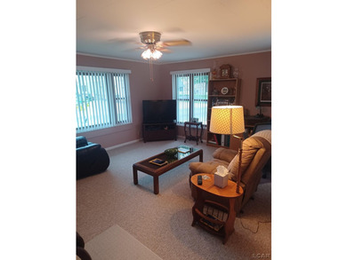 Wonderfully maintained 2 bedroom, 1 bath lakefront ranch located - photo 2