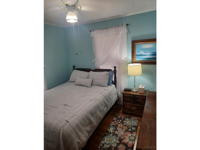 Wonderfully maintained 2 bedroom, 1 bath lakefront ranch located - photo 9