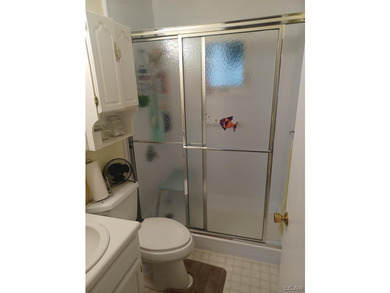 Wonderfully maintained 2 bedroom, 1 bath lakefront ranch located - photo 10