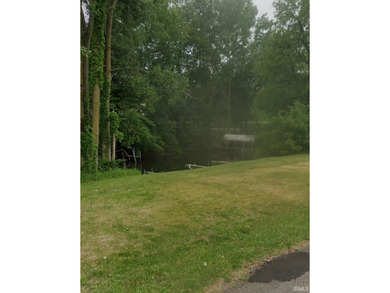 Vacant corner lot in Enchanted Hills subdivision, LAKE WAWASEE - photo 3