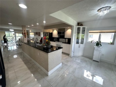 Lake Condo For Sale in Pembroke Pines, Florida