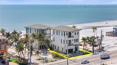 Panoramic Gulf and sand views define this elevated Gulf-front